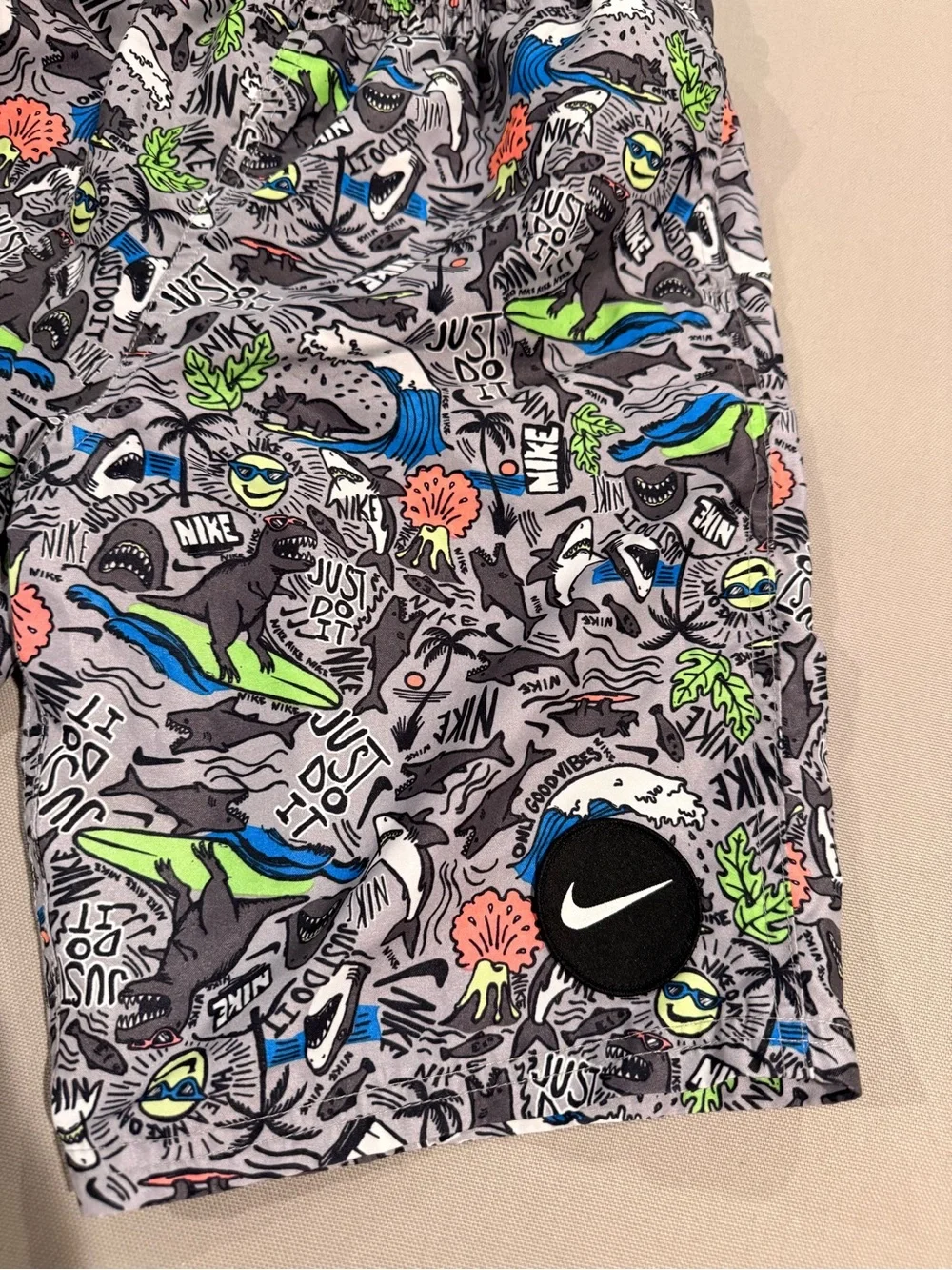 Nike Kids Gray Swim Trunks with Bright Graphic Print
